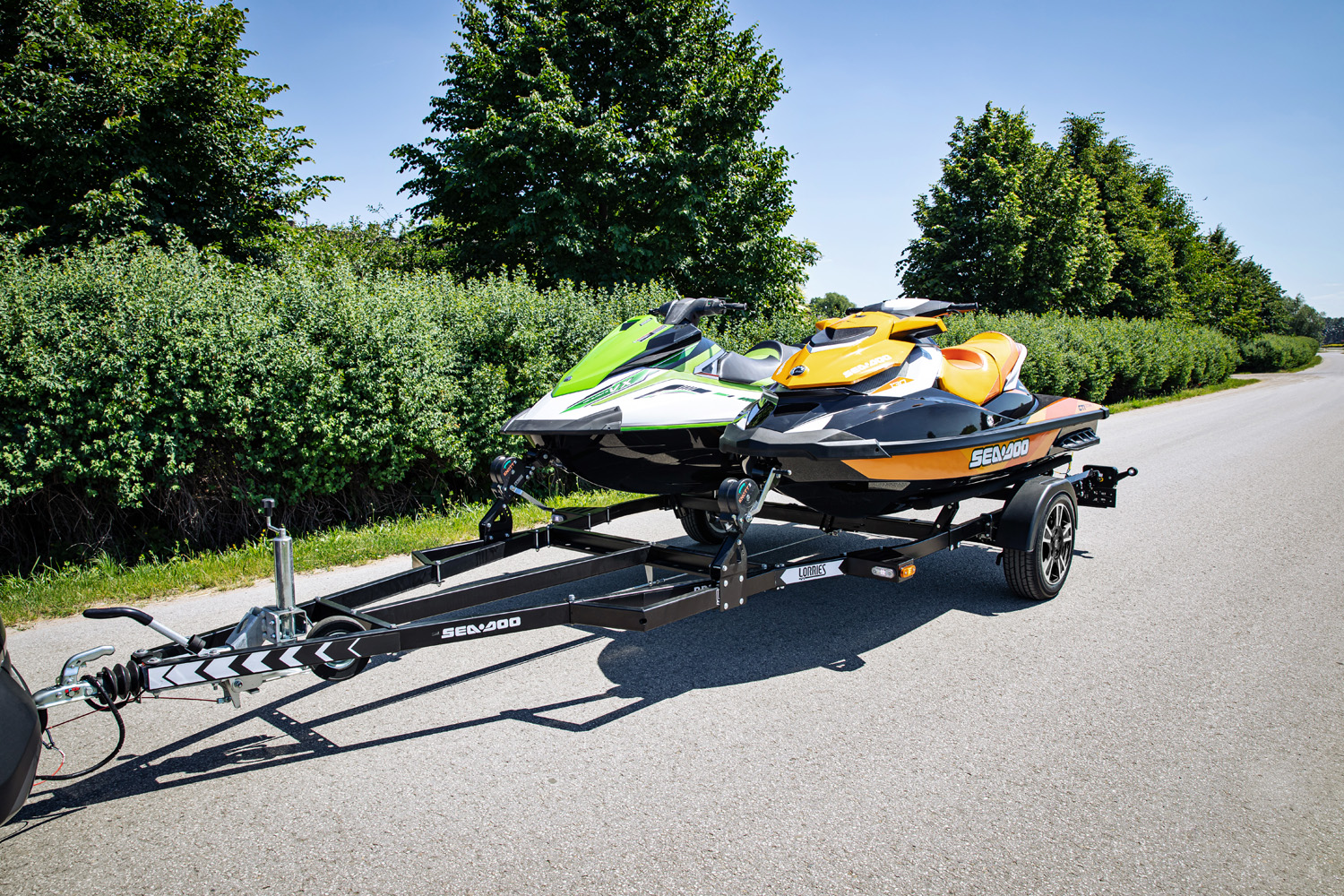 Trailer for transporting two jet skis